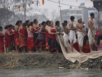 Nepalese Hindu devotees offerinf rituals during last day of a month fasting festival of Madhav Narayan Festival at Hanumanghat River, Bhakta...