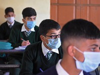 Students wearing face mask as they attend a class in Srinagar,Kashmir on March 01 ,2021.Schools across the Kashmir valley re-opened after r...