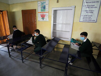  Students while maintaining social distance attend a class in Srinagar,Kashmir on March 01 ,2021.Schools across the Kashmir valley re-opened...