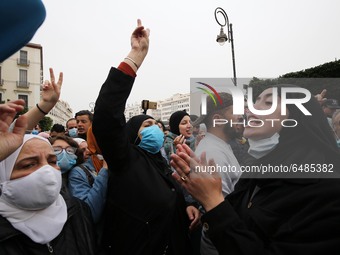Algerian demonstrators march during an anti-government demonstration called by Algerian students, in Algiers, Algeria on March 2(