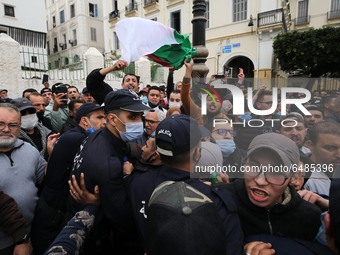Algerian demonstrators march during an anti-government demonstration called by Algerian students, in Algiers, Algeria on March 2(