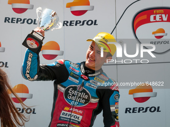 Aron Canet of Estrella Galicia Junior Team  pictured at the awards ceremony at the end of Moto3 Race in the FIM CEV Repsol 2015 which was he...