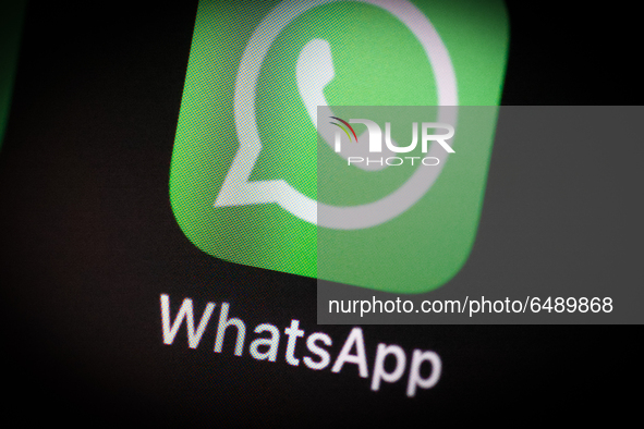 The WhatsApp application icon is seen on an iPhone home screen in Warsaw, Poland on March 3, 2021. 