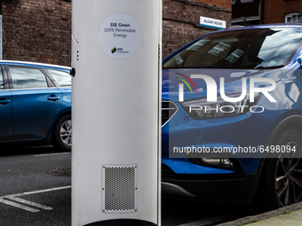 Electric car charging point as environmentalists push for greener post-pandemic country London, England March 6, 2021. One of the steps the...