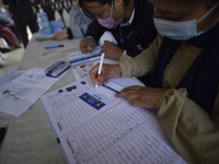 A Health worker arrange the list of the Nepalese People above 65 to gets first dose of COVID19 vaccines developed by Oxford- AstraZeneca Plc...