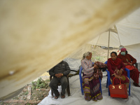 Nepalese People above 65 take rest after getting first dose of COVID19 vaccines developed by Oxford- AstraZeneca Plc at Bal Kumari Health Po...
