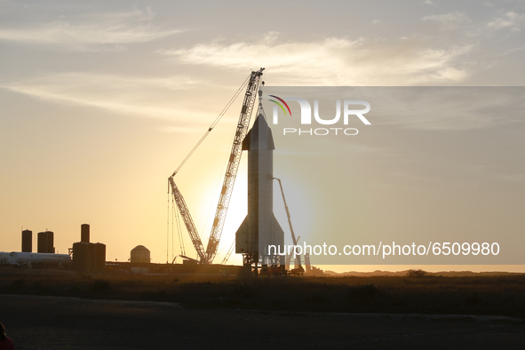 Starship SN-11 is seen at sunrise on March 9th at SpaceX's South Texas launch site in Boca Chica, Texas.  