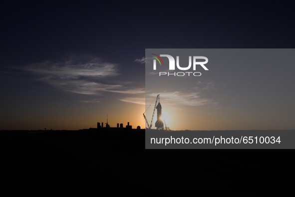 Starship SN-11 is seen at sunrise on March 9th at SpaceX's South Texas launch site in Boca Chica, Texas.  