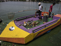 A lake filled with garbage is seen at Depok, Indonesia, on March 21, 2021.  (