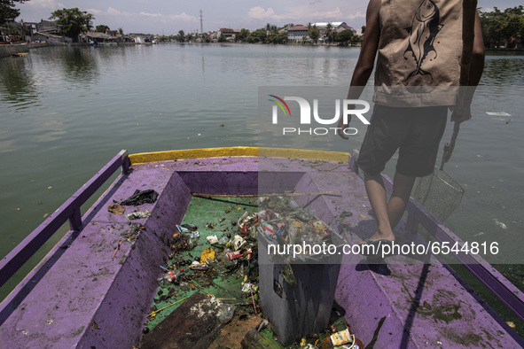 A lake filled with garbage is seen at Depok, Indonesia, on March 21, 2021.  