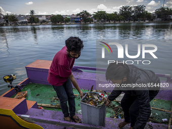 A lake filled with garbage is seen at Depok, Indonesia, on March 21, 2021.  (