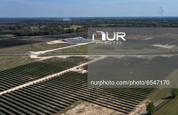 In this aerial view from a drone, the Florida Power & Light Echo River Solar Energy Center is seen on March 15, 2021 in Wellborn, Florida. T...