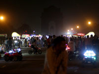 A view of the India Gate war memorial is pictured after the lights were switched off to mark Earth Hour in New Delhi, India on March 27, 202...