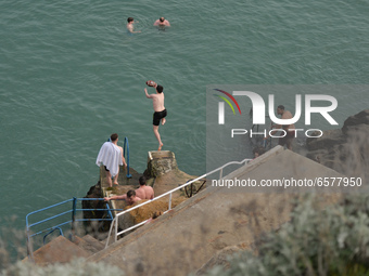 People seen at the Vico bathing place, Hawk Cliff, in Dalkey, during COVID-19 level 5 lockdown. 
On Wednesday, March 31, 2021, in Dublin, Ir...