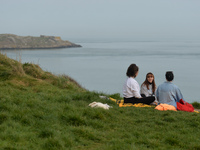 People enjoy nice weather near the Vico bathing place, Hawk Cliff, in Dalkey, during COVID-19 level 5 lockdown. 
On Wednesday, March 31, 202...