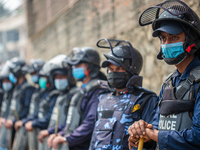 Nepalese Police guard Myanmar embassy during a protest against military coup in Myanmar in Lalitpur, Nepal on March 31, 2021. (