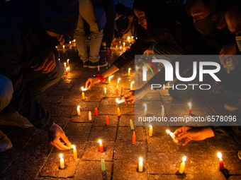 Nepalese youth attends a candlelight vigil for those who died in protests during Myanmar's military coup in Kathmandu, Nepal on March 31, 20...