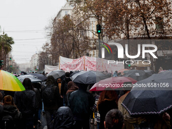 Students carry out a demonstration in a rainy day in Athens, Greece on April 1, 2021. (