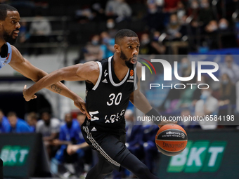 Norris Cole (R) of LDLC ASVEL Villeurbanne and Will Thomas of Zenit St Petersburg in action during the EuroLeague Basketball match between Z...