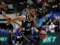 Norris Cole (R) of LDLC ASVEL Villeurbanne and Will Thomas of Zenit St Petersburg in action during the EuroLeague Basketball match between Z...