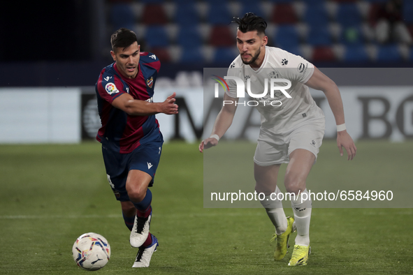 Levante's defender  Rober Pier (L) and Rafa Mir  of SD Huesca  during   spanish La Liga match between Levante UD  and  SD Huesca at Ciutat d...