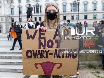 Women's rights Protestors rally to in Parliament Square, London, England on Saturday 3rd April 2021.(