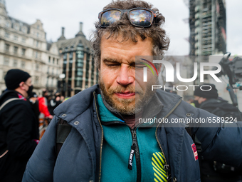 Protester sprayed by pepper spray by police in London, Britain, 3 April 2021. Protests around the United Kingdom have been held in oppositio...