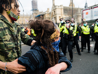 Protesters at a Kill the Bill protest pushed back by police in London, Britain, 3 April 2021. Protests around the United Kingdom have been h...