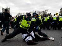 A woman is pinned down by Met Police during a Kill The Bill protest in London, Britain, 3 April 2021. Protests around the United Kingdom hav...