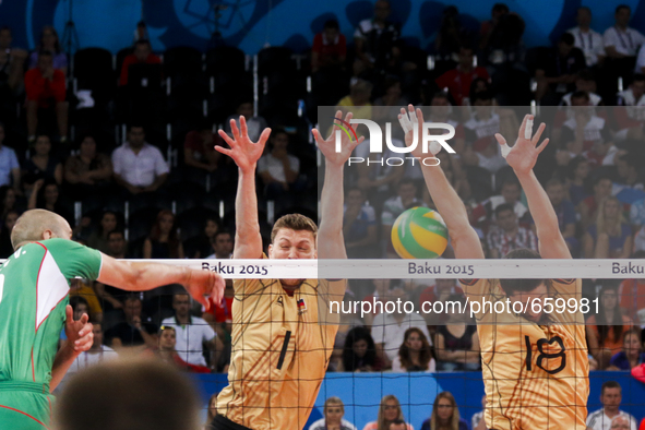 Michael ANDREI (18) and Christian FROMM (1) of Germany are jumping on the net on the hit of Valentin BRATOEV(10) of Bulgaria  in the match G...