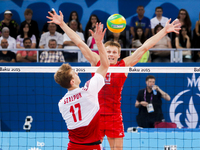 Dmitry KOVALEV (3) of Russia is jumping on the net on the hit of Artur SZALPUK (17) of Poland  in the match Poland - Russia during the final...