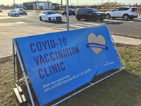 COVID-19 vaccination centre sign outside the Aaniin Community Centre in Markham, Ontario, Canada on April 07, 2021. To combat the spread of...