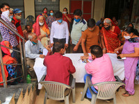 People register themselves for vaccination against COVID-19, at a camp in Jaipur,Rajasthan, India, Thursday, April 8, 2021.(