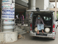 A Covid-19 patient wait inside an ambulance in front of Dhaka Medical College Hospital  for treatment in Dhaka, Bangladesh on April 08, 2021...