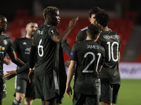 Marcus Rashford, of Manchester United scores the first goal of his team during the UEFA Europa League Quarter Final leg one match between Gr...