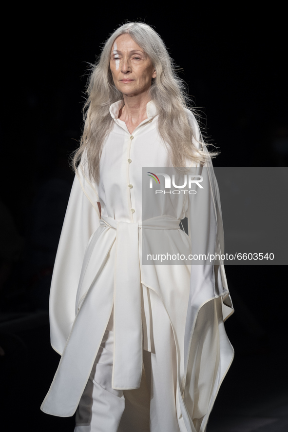 A model walks the runway at the Otrura fashion show during Mercedes Benz Fashion Week Madrid April 2021 at Ifema on April 08, 2021 in Madrid...