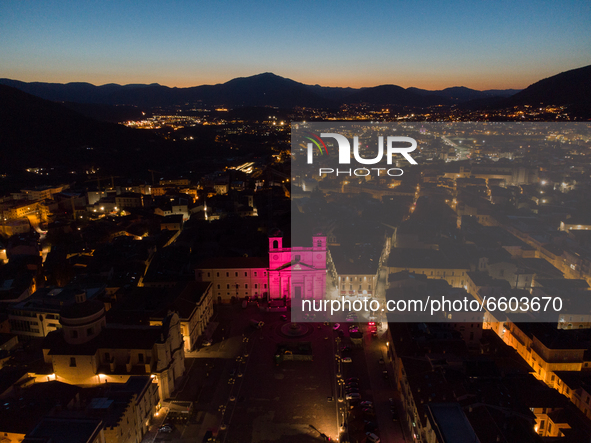 An aerial view of  Duomo of L'Aquila is lit up in pink. Giro d'Italia Trophy 