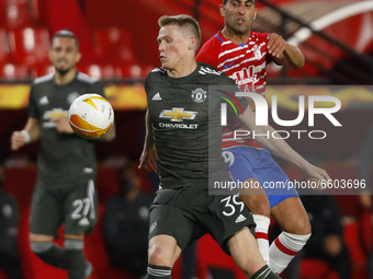 Scott Mctominay,of Manchester United and Angel Montoro, of Granada CF during the UEFA Europa League Quarter Final leg one match between Gran...