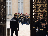 Guards of the presidency of the French republic deployed at the Elysee Palace during the state summit between French President Emmanuel Macr...