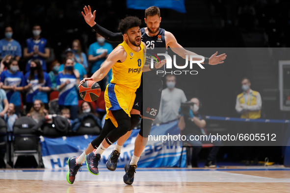 Elijah Bryant (L) of Maccabi Playtika Tel Aviv and Mateusz Ponitka of Zenit St Petersburg in action during the EuroLeague Basketball match b...