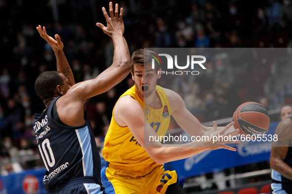 Dragan Bender (R) of Maccabi Playtika Tel Aviv in action against Will Thomas of Zenit St Petersburg during the EuroLeague Basketball match b...