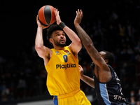 Elijah Bryant (L) of Maccabi Playtika Tel Aviv in action during the EuroLeague Basketball match between Zenit St Petersburg and Maccabi Play...