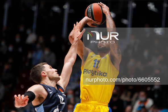 Tyler Dorsey (R) of Maccabi Playtika Tel Aviv shoots as Billy Baron of Zenit St Petersburg defends during the EuroLeague Basketball match be...