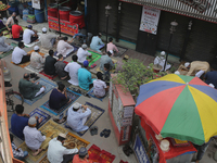 Muslims performed Friday prayer at a street as they are not maintaining any kind of social distance in Dhaka , Bangladesh  on April 09, 2021...