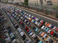 Hundreds of Muslim performed Friday prayer at a street as they are not maintaining any kind of social distance in Dhaka , Bangladesh  on Apr...