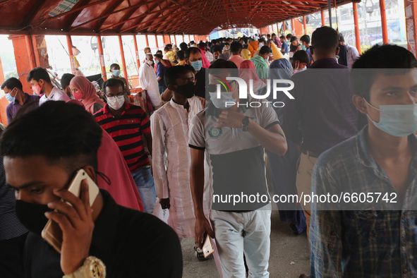 People gather at Dhaka New market for shopping as they not maintaining any kind of social distance in Dhaka, Bangladesh on April 09, 2021....