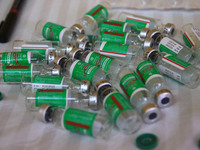 Empty vials of' 'Covishield' COVID-19 vaccine , at a camp  in Jaipur,Rajasthan, India, Saturday, April 10, 2021.(