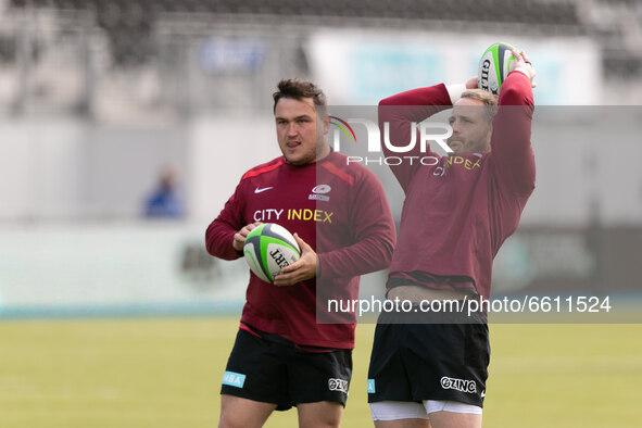 Vincent Koch and Jamie George of Saracens warms up ahead to the Greene King IPA Championship match between Saracens and Bedford Blues at All...
