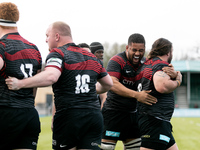  Saracens players celebrate after beating Bedford Blues during the Greene King IPA Championship match between Saracens and Bedford Blues at...