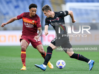 Bryan Reynolds of AS Roma and Mattias Svanberg of Bologna FC compete for the ball during the Serie A match between AS Roma and Bologna FC at...